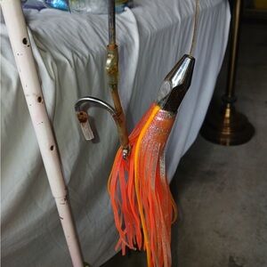 Bright Orange Fishing Lure with Silver Head